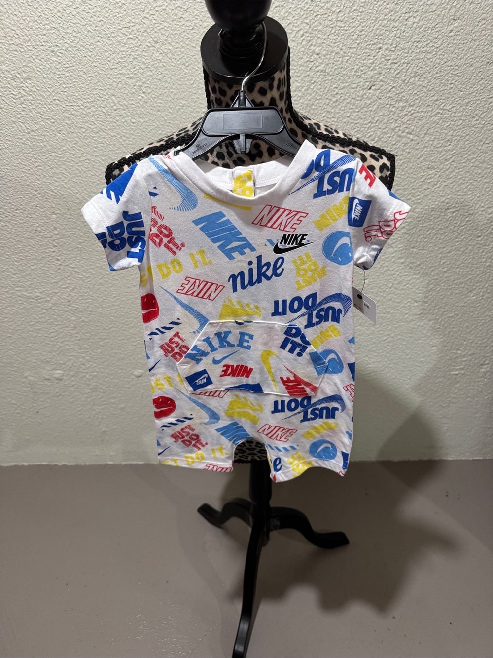 Nike White Short Sleeve Tee with Red, Blue & Yellow Logos